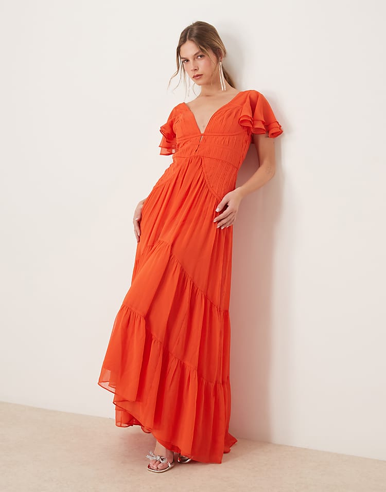 https://images.asos-media.com/products/asos-design-flutter-sleeve-ruched-maxi-dress-with-hi-low-hem-in-spicy-red/207527342-1-spicyred?$n_750w$&wid=750&fit=constrain